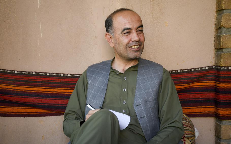 Zubair Babakarkhail takes notes during an interview with a source in Kabul, Afghanistan, on Oct. 19, 2020.