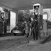 An American gets his montly ration of five gallons at the one-service station in Berlin still serving privately-owned vehicles due to the Berlin Blockade.
