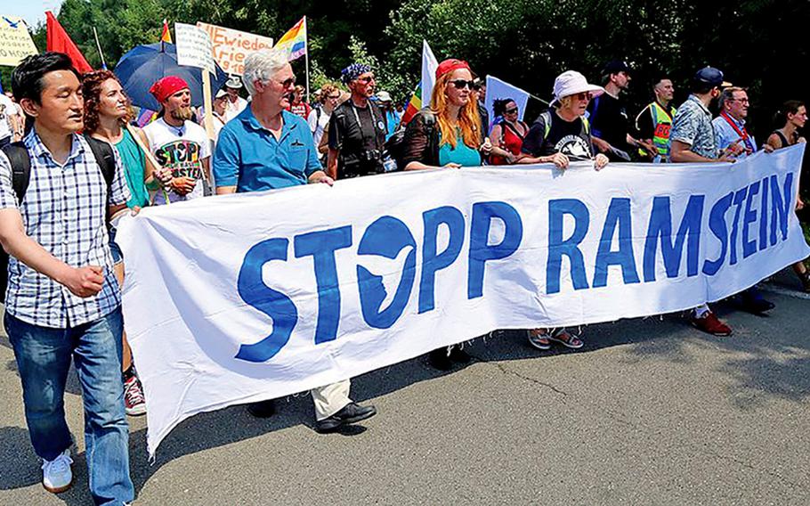 Protesters march outside Ramstein Air Base, Germany, in 2018. Peace activists are expected to demonstrate again this year, beginning July 4, 2021.