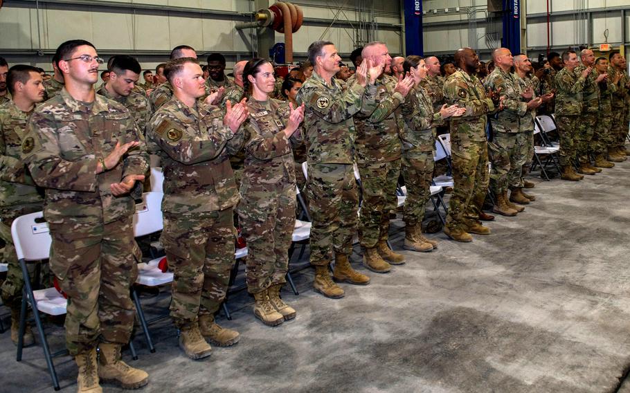 Airmen from the 557th Expeditionary Rapid Engineer Deployable Heavy Operational Repair Squadron Engineers, known as “Red Horse,” at a deactivation ceremony at Al Udeid Air Base, Qatar, on Oct. 15, 2022.
