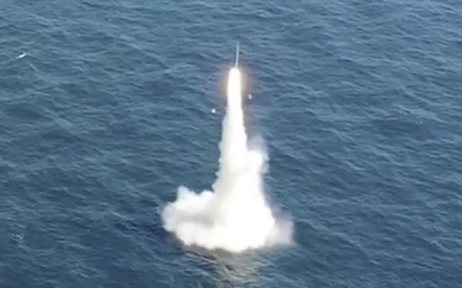 A video screen grab shows South Korea's first underwater-launched ballistic missile as it is test-fired from a 3,000-ton-class submarine at an undisclosed location in the waters of South Korea, on Sept. 15, 2021. 