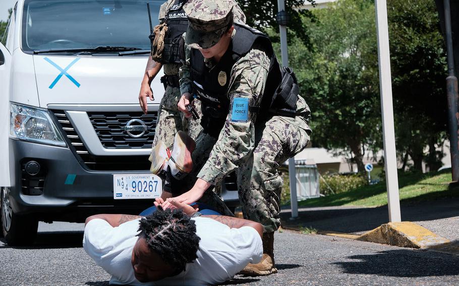 Sailors participate in a simulated breach of base security on Aug. 16, 2022, as part of the annual Citadel Pacific exercise. 