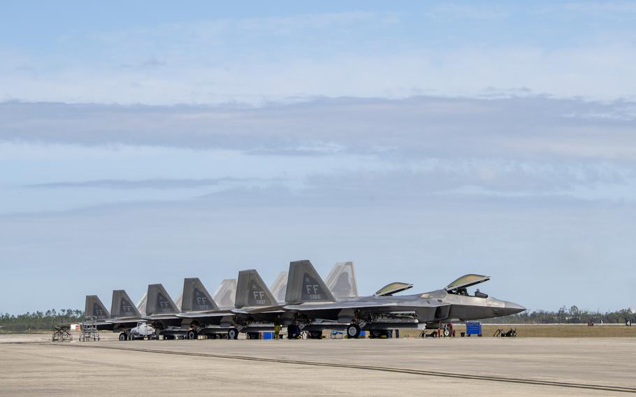 U.S. Air Force F-22 Raptors assigned to the 94th Fighter Squadron, Joint Base Langley-Eustis, Va., sit on the flight line at Tyndall Air Force Base, Fla., March 14, 2022.