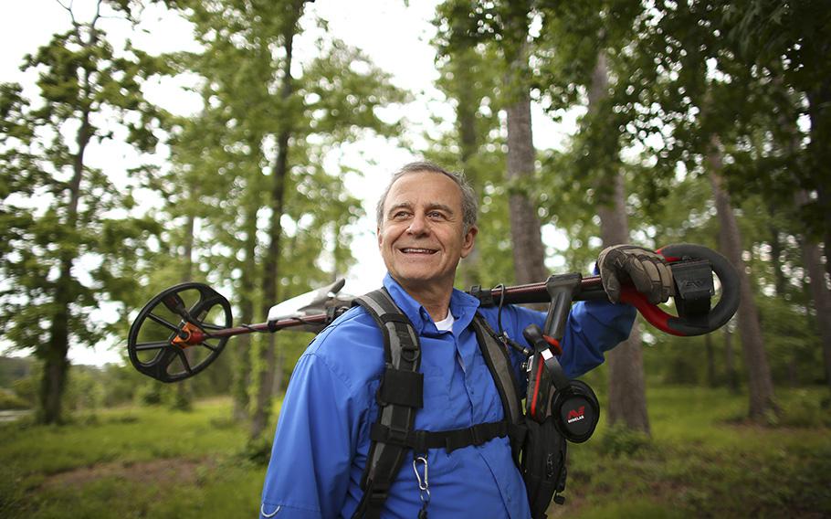 Greg Stoeger recovered a wallet lost 25 years ago while he was searching for Civil War relics with his metal detector in Suffolk.