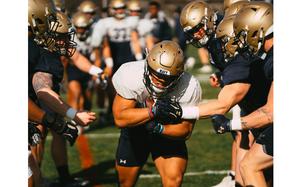 The Navy Midshipmen are working on installing a new offense during spring practice.