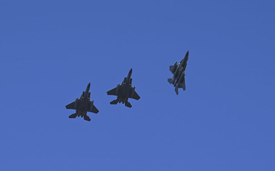 Three F-15C Eagles from the 67th Fighter Squadron at Kadena Air Base, Okinawa, fly over Royal Australian Air Force Base Darwin, Australia, Aug. 15, 2022. 