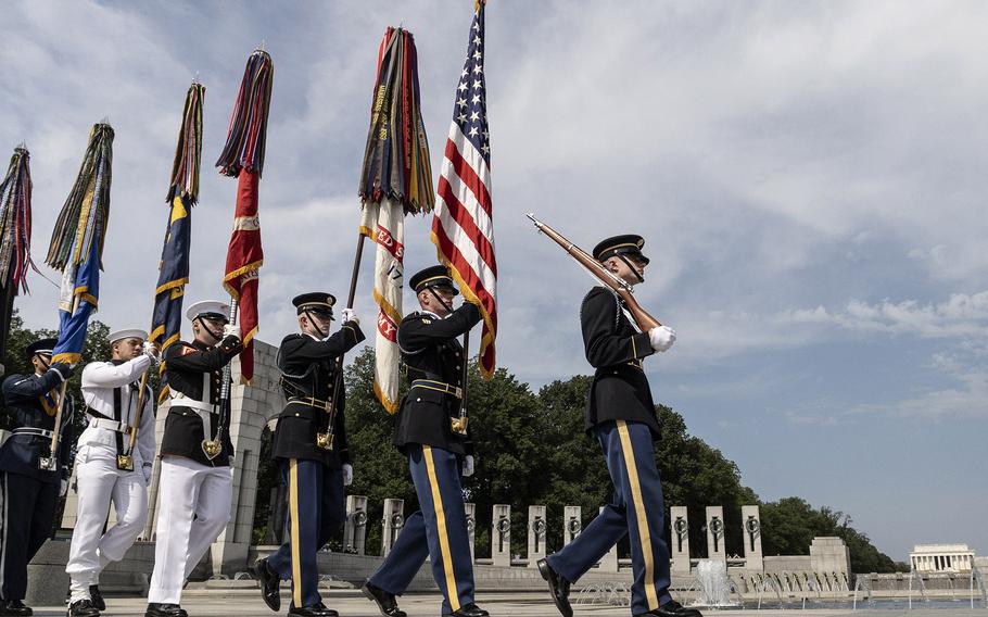 The Armed Forces Color Guard arrives for the 20th anniversary celebration of the National World War II Memorial in Washington, D.C., May 25, 2024.