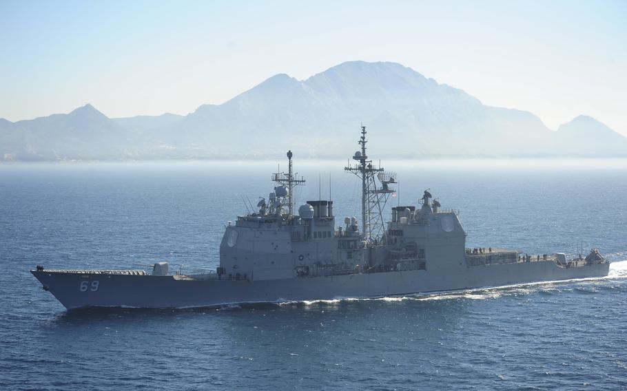USS Vicksburg, a Ticonderoga-class guided-missile cruiser, passes through the Strait of Gibraltar on March 31, 2015. The House Armed Services Committee’s subpanel on seapower and projection forces plans to prohibit the Navy from cutting the Vicksburg as well as four landing dock ships from its fleet, according to committee aides.