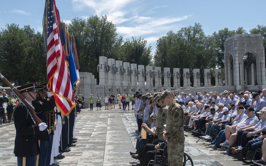 A moment of silence is observed at the World War II Memorial in Washington, D.C., on Wednesday, Aug. 18, 2021, during an Honor Flight ceremony that paid tribute to veterans from World War II, the Korean War and the Vietnam War.