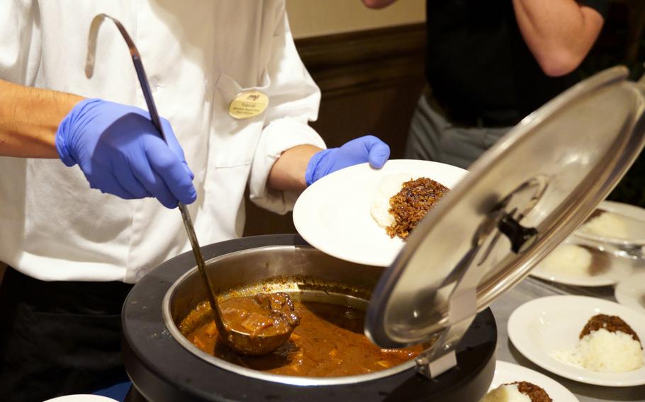 Kizuna 111 is served during a curry-tasting event at Club Alliance on Yokosuka Naval Base, Japan, July 21, 2023. 