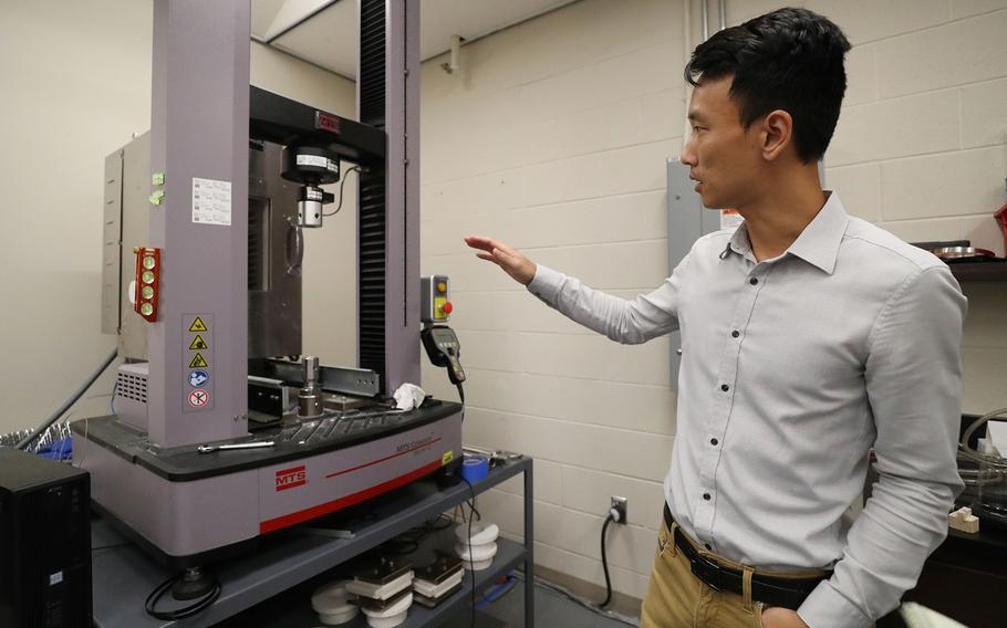 University of Central Florida Assistant professor Kawai Kwok is seen at the Structures & Materials Design Laboratory, on June 22, 2022. Kwok’s work focuses on developing shape-changing structures. These kinds of structures can be used on space missions, for drone work and for solar sails and blades among other applications. 