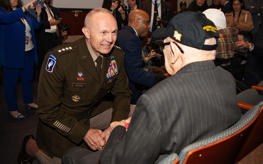 Gen. Randy A. George, Chief of Staff of the U.S. Army, greets John Christman before a special ceremony honoring World War II Ghost Army veterans on March 21, 2024.