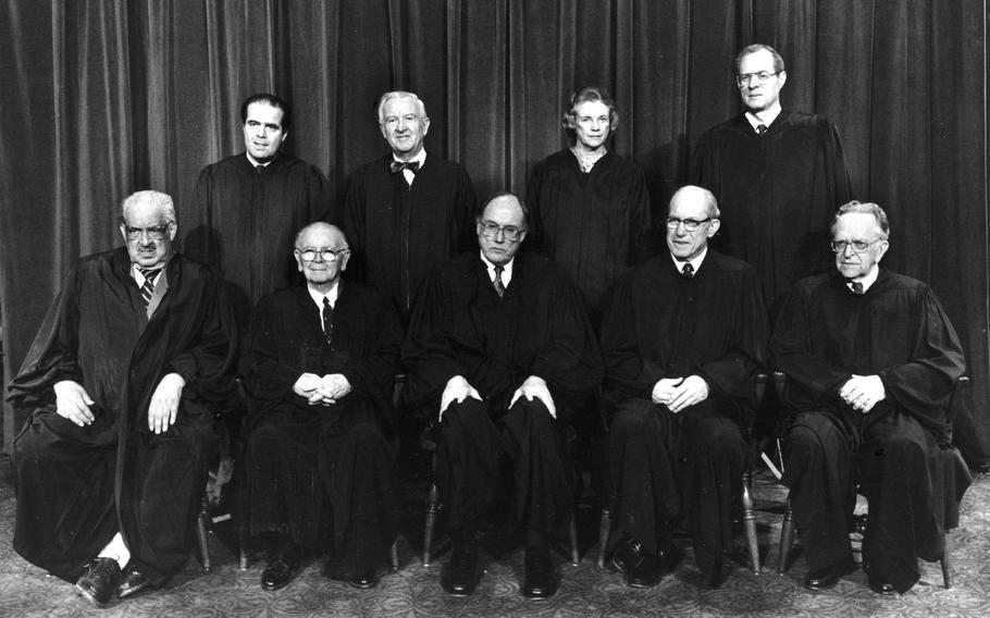 Official portrait of the Supreme Court in April 1988. The first two seated justices on the left, Thurgood Marshall and William Brennan, both retired under Republican President George H.W. Bush, shifting the court rightward and putting Roe v. Wade in danger.