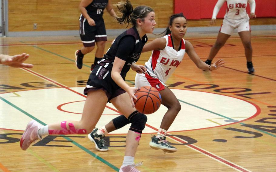 Juliet Bitor dribbles against pressure.