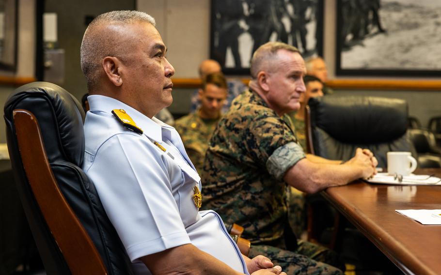 Rear Adm. Utai Youngwilai, left, chief of staff, Royal Thai Marine Corps, and U.S. Marine Corps Lt. Gen. William M. Jurney, commander, U.S. Marine Corps Forces Pacific, participate in the first Marine-to-Marine Future Engagement Planning event at Camp H. M. Smith, Hawaii, May 8, 2023.