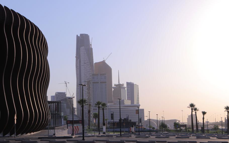 Skyscrapers stand in the King Abdullah Financial District (KAFD) beyond an empty parking lot in Riyadh, Saudi Arabia, on July 28, 2020. 