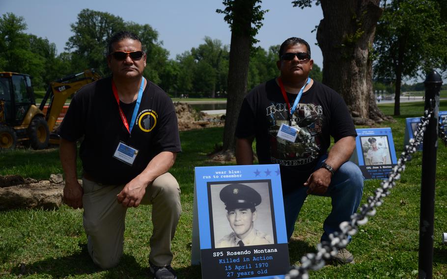 Rolando Montana, left, and brother Rosendo Montana Jr., right, are in Washington to honor their father who died during the Vietnam War on April 15, 1970. They attended a Vietnam veterans event taking place near the National Mall on Thursday, May 11, 2023. 