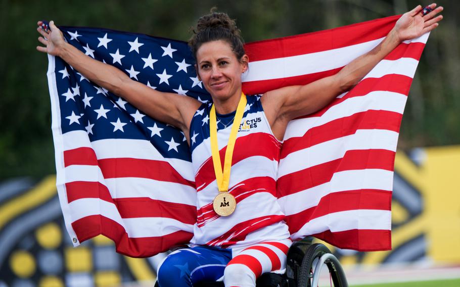 Kelly Elmlinger received a gold medal in the women’s 200 meters at the 2017 Invictus Games at the York Lions Stadium in Toronto, Canada, on Sept. 24, 2017. 