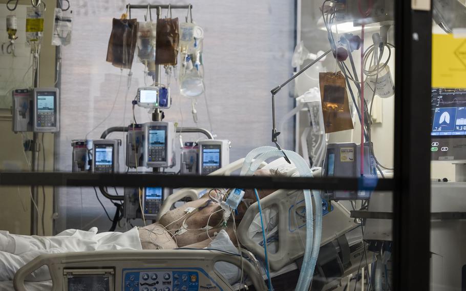 An intubated patient inside a negative pressure room in the COVID-19 ICU at a hospital in Joplin, Mo., on Aug. 3. 