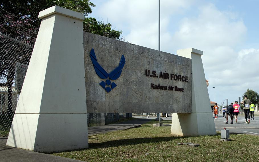 A sign at a U.S. base entrance says, “U.S. Air Force Kadena Air Base.”
