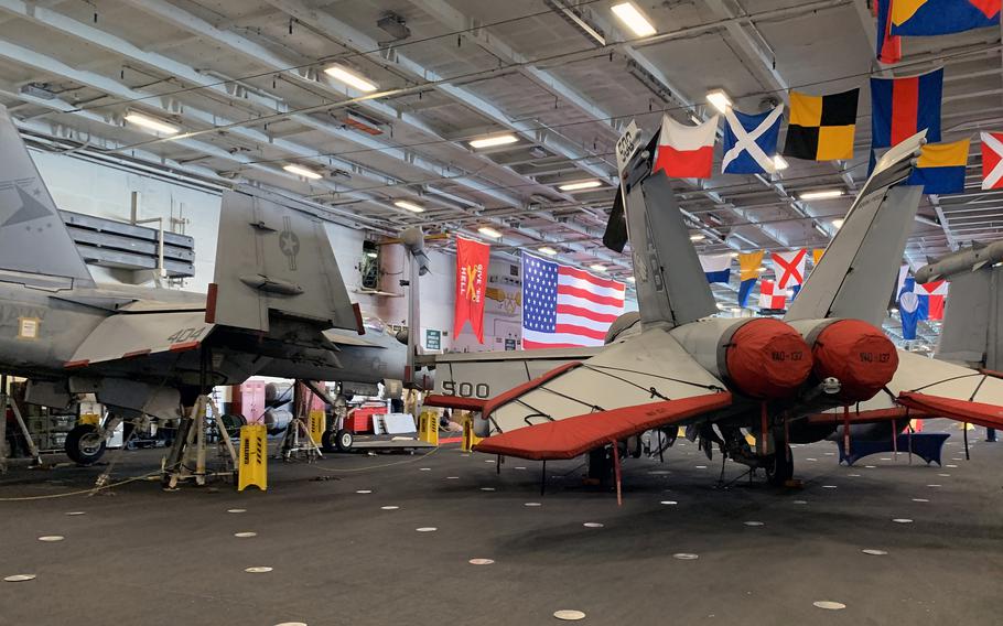 Aircraft are parked on a hangar deck of the USS Harry S. Truman on May 11, 2022. The carrier arrived in Naples, Italy, the day before for a port call.