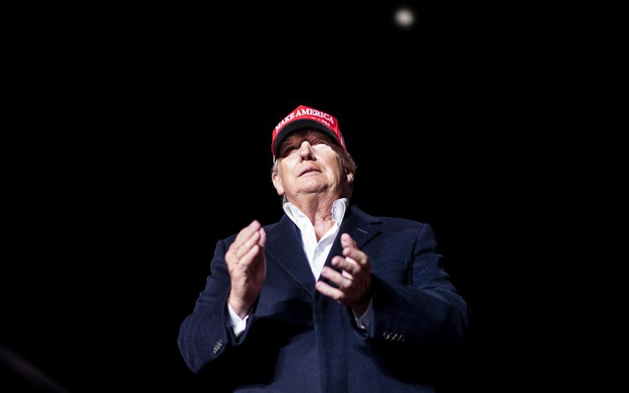 Former president Donald Trump speaks to thousands of supporters at an outdoor rally in 2022 in Florence, Ariz. 