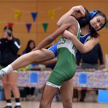 Rota’s Quennette Kirkconnell, right, got the better of Deshaun Bowie in a first-round 106-pound match at the DODEA-Europe wrestling finals in Wiesbaden, Germany, Feb. 10, 2023.