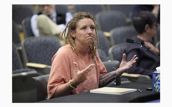 Cara Lamb, ex-wife of shooter Robert Card, testifies, Thursday, May 16, 2024, in Augusta, Maine, during a hearing of the independent commission investigating the law enforcement response to the mass shooting in Lewiston, Maine. (AP Photo/Robert F. Bukaty)