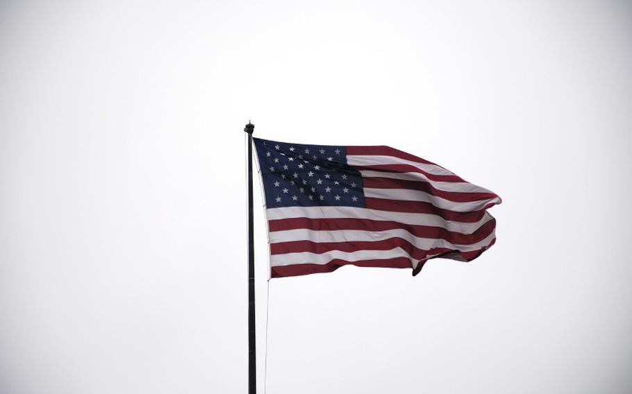 The black poles are signature to National Veterans Flagpoles United, an organization that presents flags and flagpoles to veterans across Oklahoma.