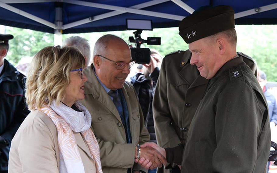 Anna dal Ferro and Franco Miotto, the parents of Cpl. Matteo Miotto, meet with U.S. Army Maj. Gen. Todd Wasmund on May 7, 2024, the day of a ceremony naming the base in Longare, Italy, after their son. The Italian base hosts the U.S. Army's 207th Military Intelligence Brigade (Theater).