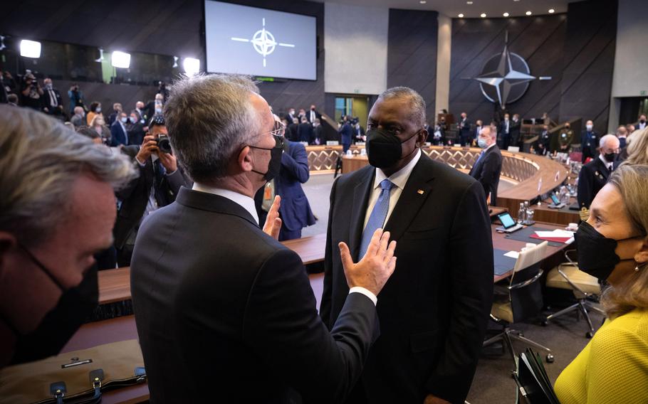  NATO Secretary-General Jens Stoltenberg talks with U.S. Defense Secretary Lloyd J. Austin before the start of the NATO Atlantic Council meeting at the organization's headquarters in Brussels, Feb. 16, 2022.