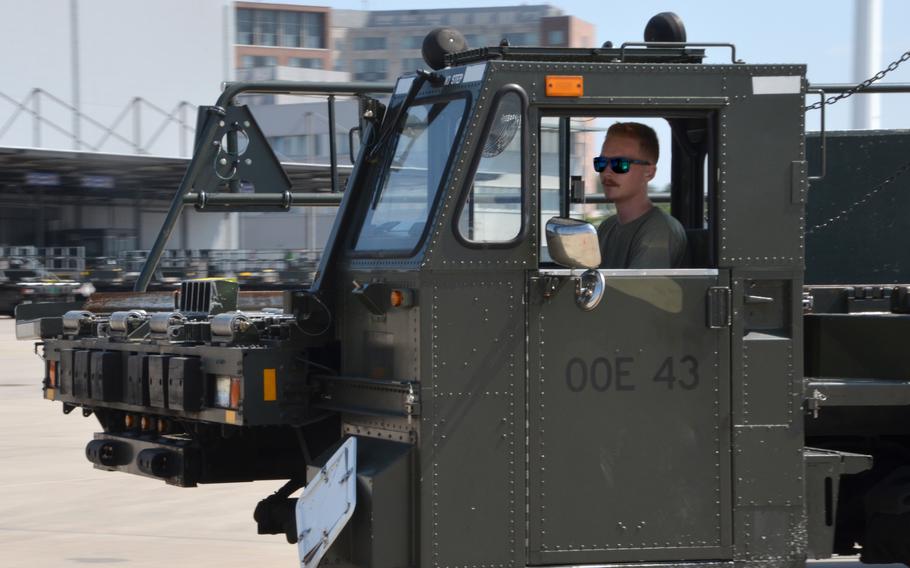 Airman 1st Class Ryan Joy drives a Tunner 60K aircraft cargo loader during the 721st Aerial Port Squadron Multi-Capable Airmen Rodeo at Ramstein Air Base, July 23, 2021.