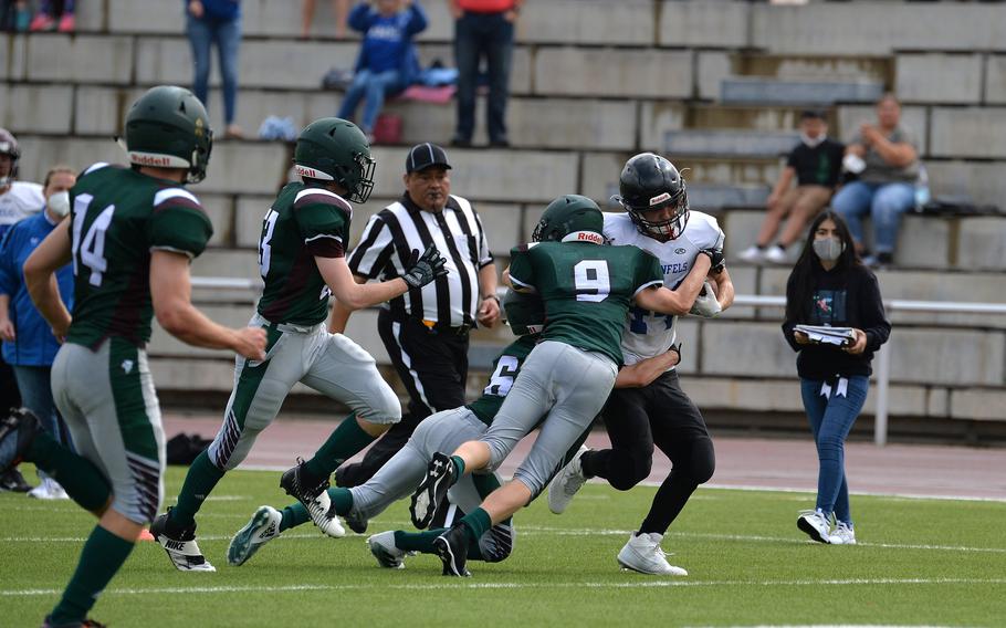 A pride of AFNORTH Lions gang up on Jaiden Workman of Hohenfels in the Tigers’ 76-28 loss to the Lions in a game played at Kaiserslautern High School, Sept. 11, 2021. AFNORTH made one of the relatively few international trips on the fall schedule, venturing from its Netherlands base to Germany, where it met the Tigers halfway for six-man Division III football action on a neutral field. 