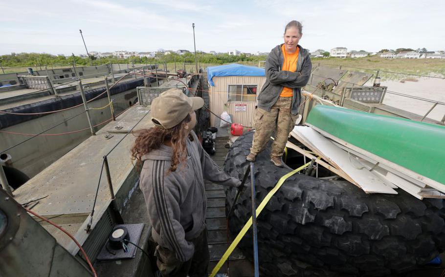 Two Vietnam-era amphibious vehicles sit on Cove beach in Brigantine, Tuesday, May 24, 2022.