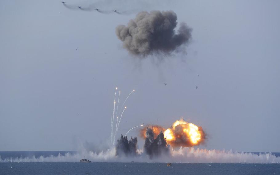 Russian military planes and navy ships take a part in military drills on the Black Sea coast of Crimea, on Sept. 9, 2016, as cruise missiles and other armaments were deployed. Ukrainian and British officials warned on Saturday, June 11, 2022, that Russian forces are relying on weapons able to cause mass casualties as they try to make headway in capturing eastern Ukraine.