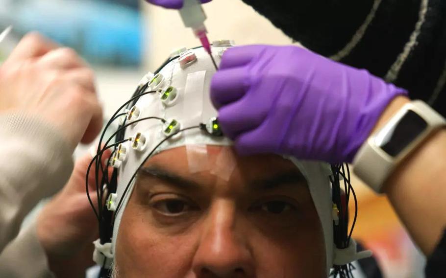 A man wearing an electro-cap