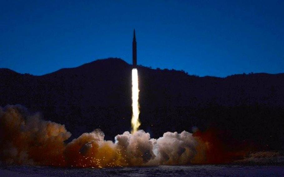 A North Korean missile takes flgiht in this image released Wednesday, Jan. 12, 2022, by the state-run Korean Central News Agency. 