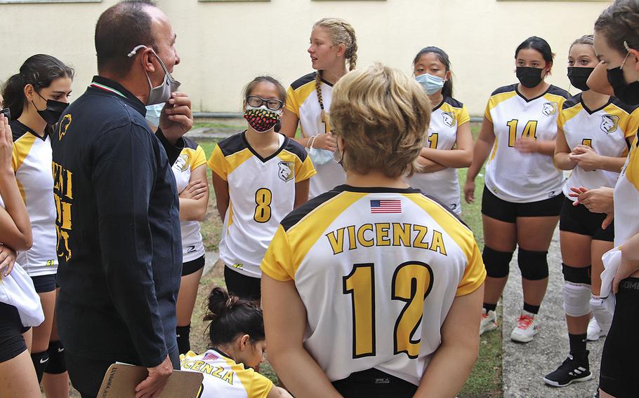 John Kohut, the Vicenza girls volleyball coach, talks to his team in between games Saturday. Vicenza won the match in straight games, 25-12, 25-12, 25-10. 