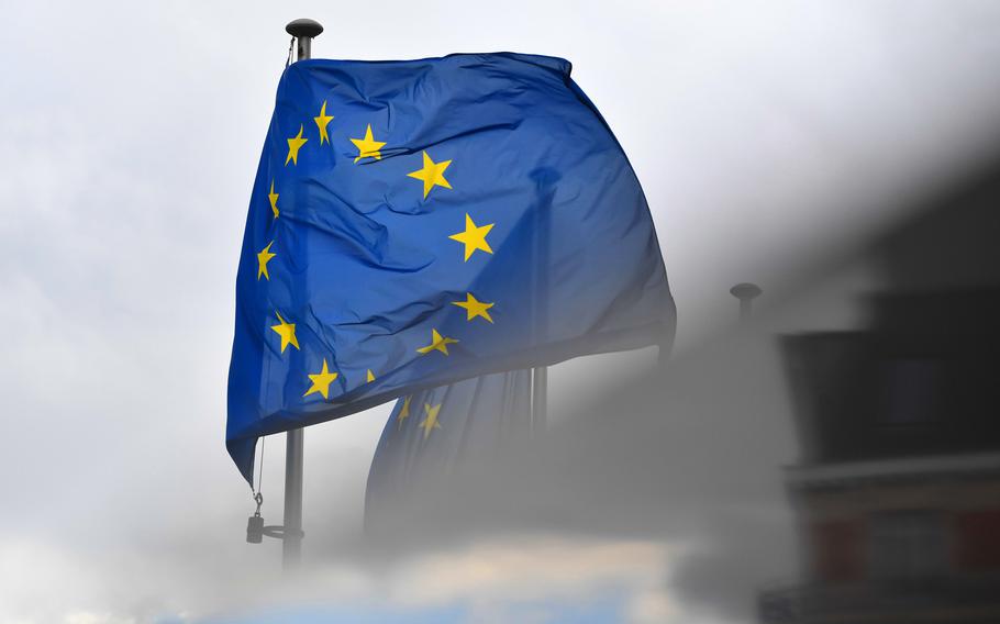 A European Union flag flies outside the Berlaymont in Brussels on Oct. 7, 2020.