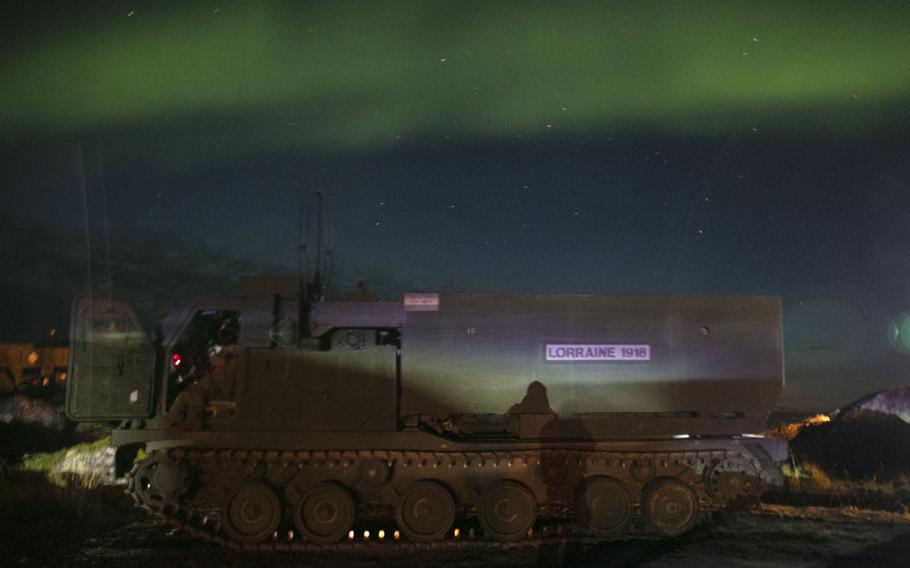 The northern lights shined above the soldiers from the 1st Battalion, 6th Field Artillery Regiment, 41st Field Artillery Brigade after they successfully fired six M31 rockets during the Thunder Cloud live-fire exercise in Andoya, Norway, on Sept. 15, 2021. 