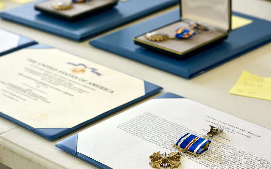 Four airmen assigned to the 18th Wing at Kadena Air Base, Okinawa, recently received medals for valor for their actions three years ago during an Iranian rocket attack on al Asad Air Base in Iraq.
