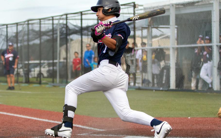 Kadena's Waioni Mandac takes his swings against Kubasaki.