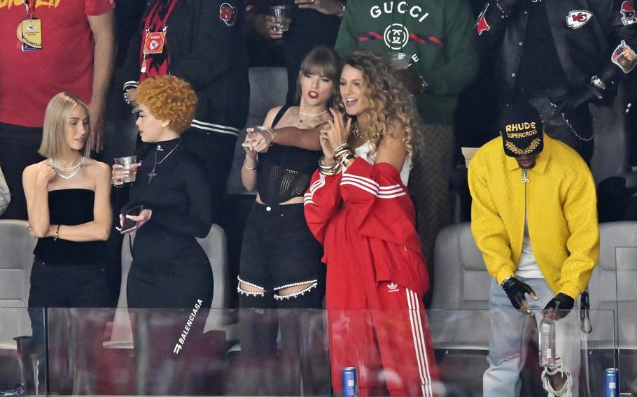 Ashley Avignone, from left, Ice Spice, Taylor Swift and Blake Lively talk before the NFL Super Bowl 58 football game between the San Francisco 49ers and the Kansas City Chiefs on Sunday, Feb. 11, 2024, in Las Vegas.