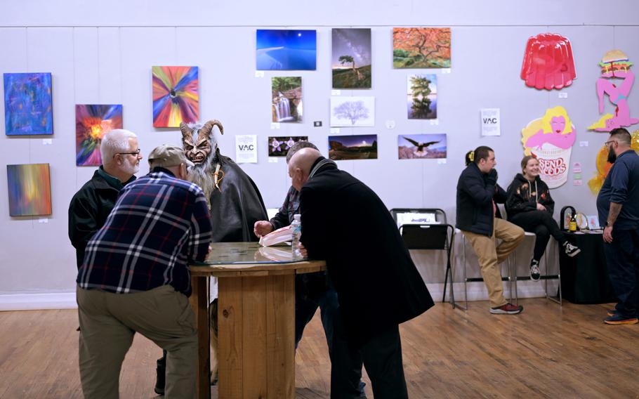 VFW Post 1 opened showcasing veteran-centered art pieces for the public to view during First Friday Walk of Santa Fe Drive in Denver, Colo., on Dec. 1, 2023. 