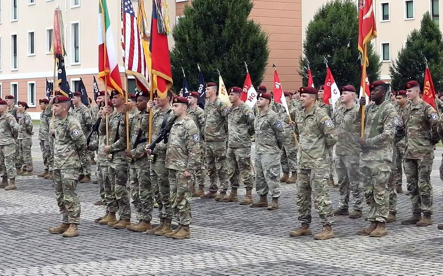 The color guard and soldiers of the 173rd Airborne Brigade stand in formation at the unit's change of command ceremony in Vicenza, Italy, on July 6, 2023. Col. Joshua Gaspard replaced the outgoing commander, Col. Michael Kloepper, at the ceremony.