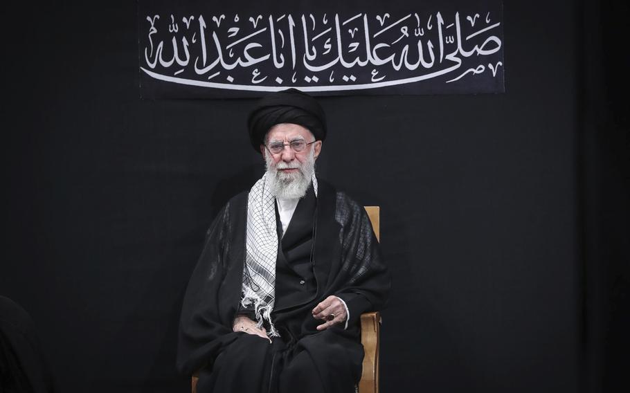 Supreme Leader Ayatollah Ali Khamenei attends a mourning ceremony.