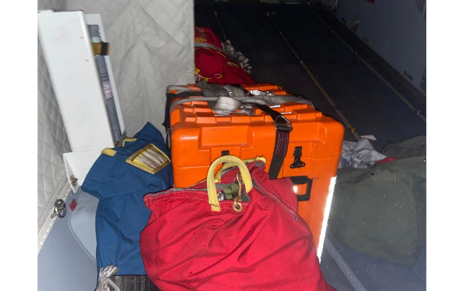 Supplies meant for stranded mariners and migrants are set in the back of a U.S. Coast Guard C-144 Ocean Sentry plane Jan. 14, 2023.