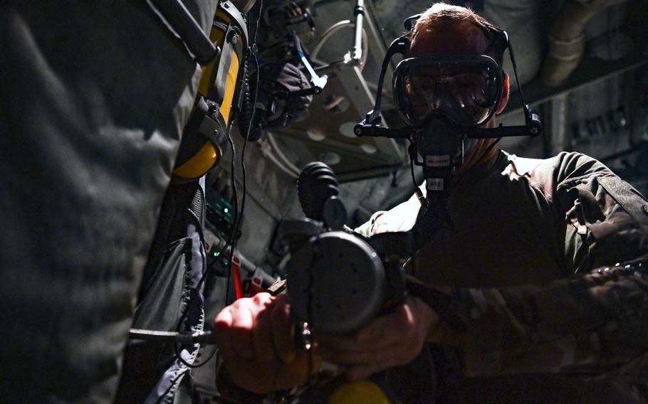 A medical technician with the 405th Expeditionary Aeromedical Evacuation Squadron performs a preflight check on an oxygen bottle at Bagram Airfield, Afghanistan, Oct. 29, 2019. The U.S. drawdown in Afghanistan has left the squadron understaffed in 2021 and placed unit members under greater stress than usual.