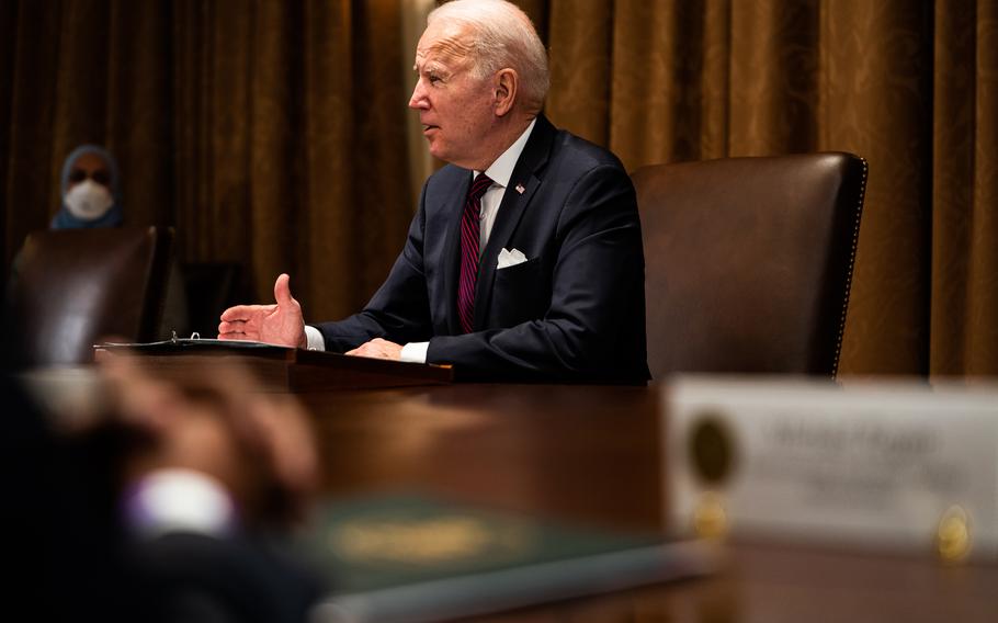 President Joe Biden delivers remarks during a meeting with Vice President Kamala Harris and members of the Infrastructure Implementation Task Force in the Cabinet Room of the White House on Thursday. 