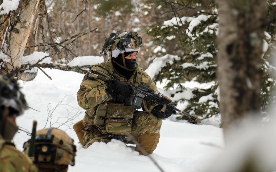 Paratroopers from the 501st Parachute Infantry Regiment, 4th Infantry Brigade Combat Team, 25th Infantry Division, conduct a reconnaissance and surveillance patrol during Joint Pacific Readiness Multinational Readiness Center rotation near Fort Greely, Alaska, March 16, 2022. 